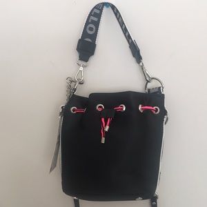 Zara pouch style with draw string belted crossbody hand bag.